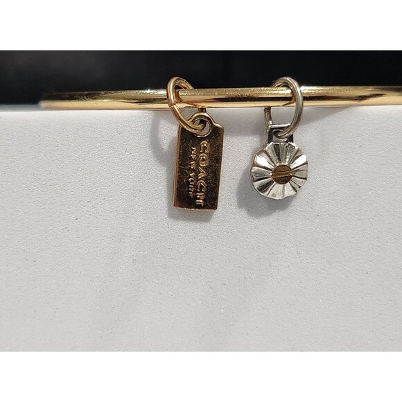 Coach Gold-tone Bangle Bracelet With Tag & Sunburst Charms - Picture 2 of 5